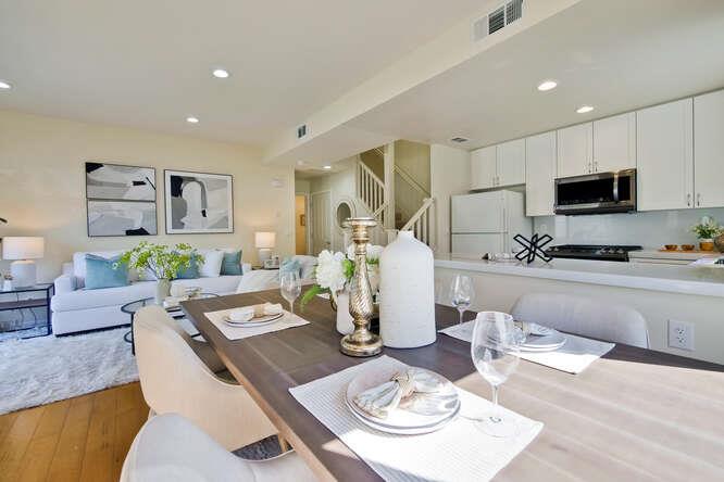 Cottage Court Mountain View, CA 94043 - Photo 11 of 43 a living room with furniture kitchen view and a wooden floor