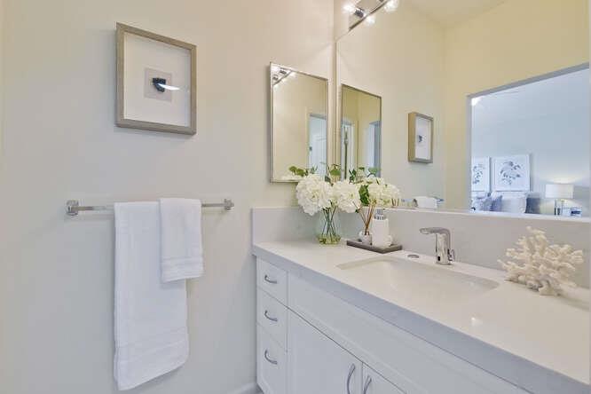 Cottage Court Mountain View, CA 94043 - Photo 23 of 43 a bathroom with a sink and a mirror