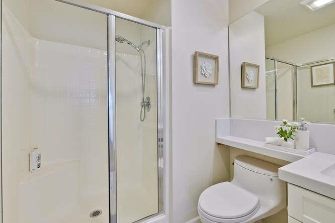 Cottage Court Mountain View, CA 94043 - Photo 30 of 43 a white toilet sitting next to a bathroom sink