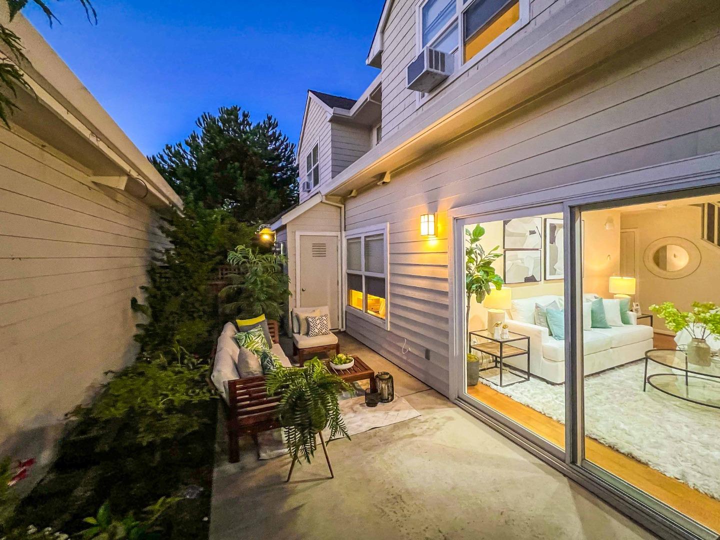Cottage Court Mountain View, CA 94043 - Photo 3 of 43 a view of a patio with table and chairs and potted plants