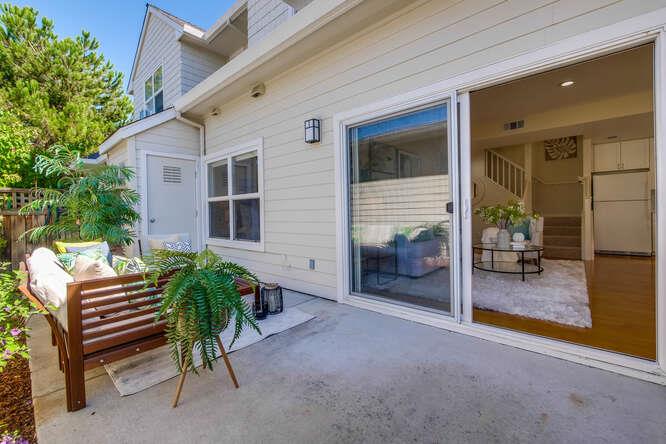 Cottage Court Mountain View, CA 94043 - Photo 33 of 43 a backyard of a house with barbeque oven table and chairs