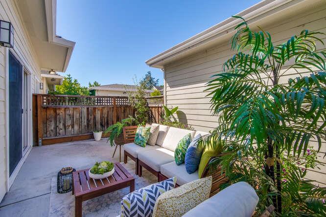 Cottage Court Mountain View, CA 94043 - Photo 34 of 43 a view of a patio with couches table and chairs and potted plants