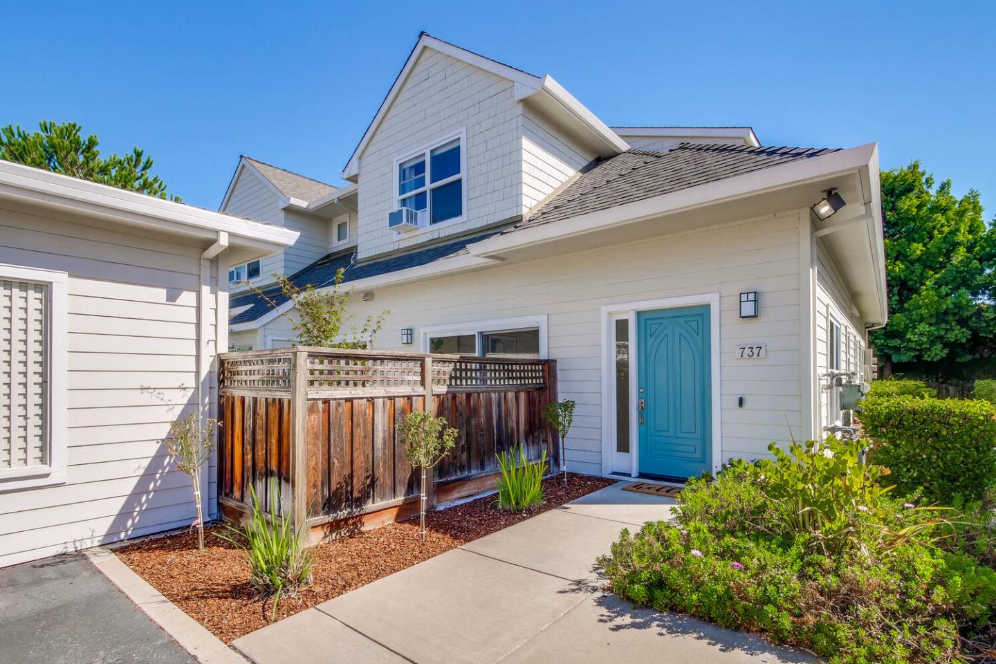 Cottage Court Mountain View, CA 94043 - Photo 43 of 43 a view of a house with wooden walls