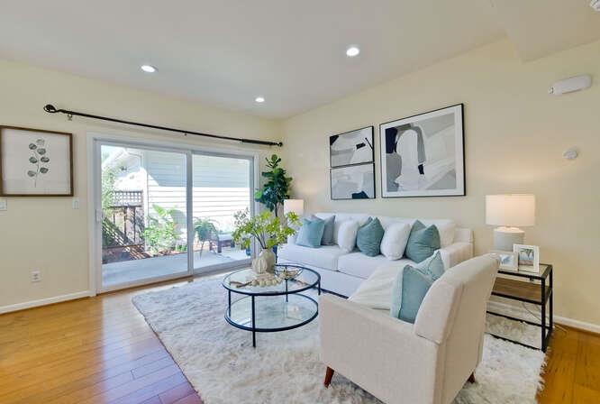 Cottage Court Mountain View, CA 94043 - Photo 5 of 43 a living room with furniture and a large window