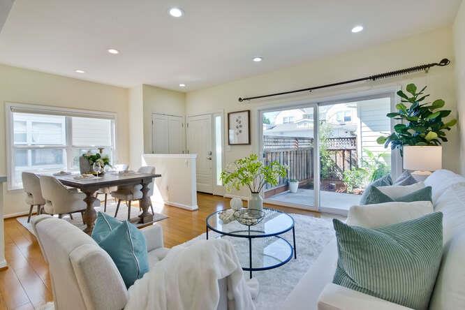 Cottage Court Mountain View, CA 94043 - Photo 8 of 43 a living room with furniture and a large window