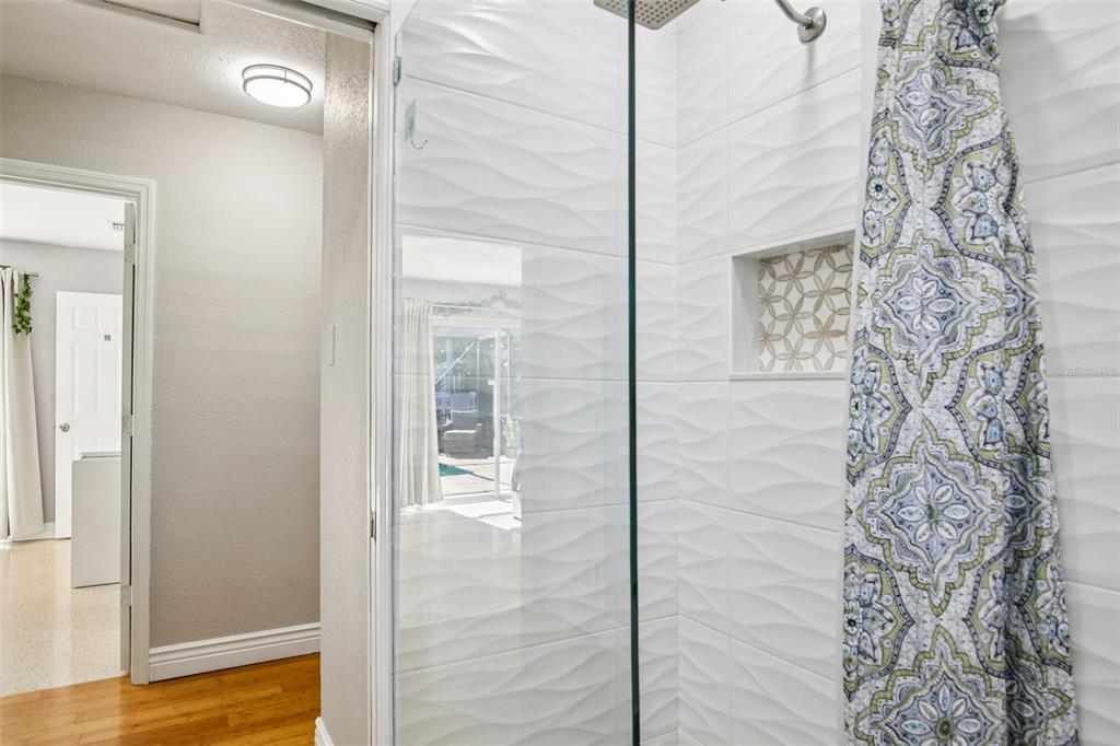 3966 High Bluff Drive Largo, FL 33770 - Photo 17 of 40 a bathroom with a shower
