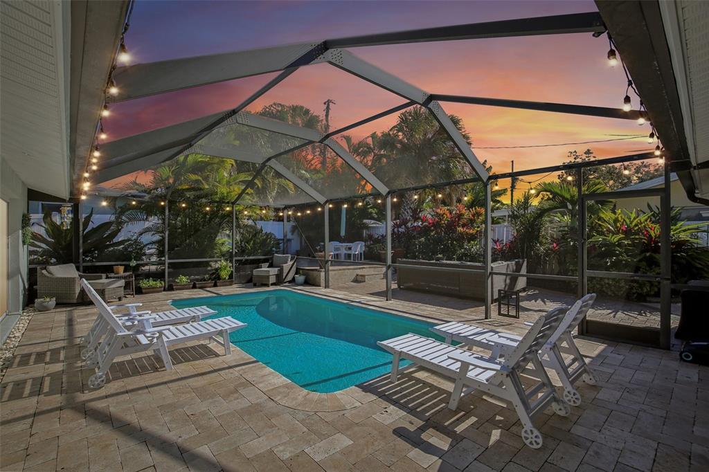 3966 High Bluff Drive Largo, FL 33770 - Photo 2 of 40 a view of outdoor space yard deck patio and swimming pool