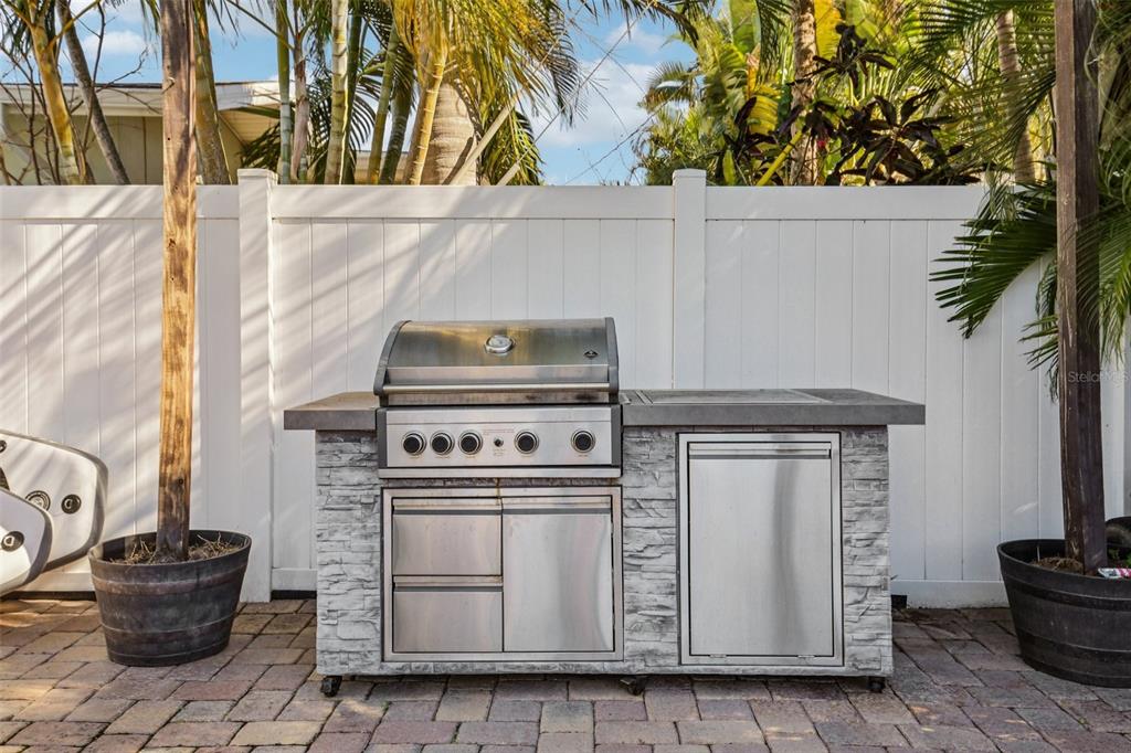 3966 High Bluff Drive Largo, FL 33770 - Photo 34 of 40 a white stove top oven sitting inside of a kitchen