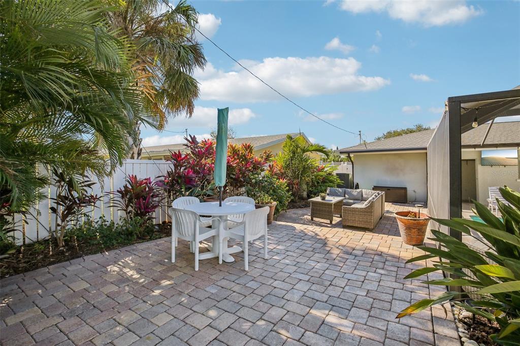 3966 High Bluff Drive Largo, FL 33770 - Photo 36 of 40 a chairs and table in a patio