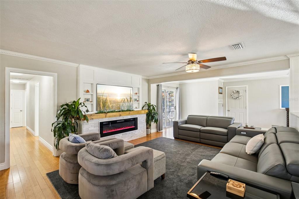 3966 High Bluff Drive Largo, FL 33770 - Photo 7 of 40 a living room with furniture and a flat screen tv