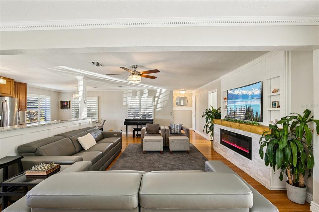 3966 High Bluff Drive Largo, FL 33770 - Photo 8 of 40 a living room with furniture and a large window