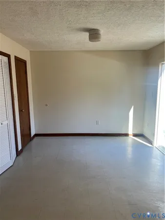 a view of a refrigerator in a room