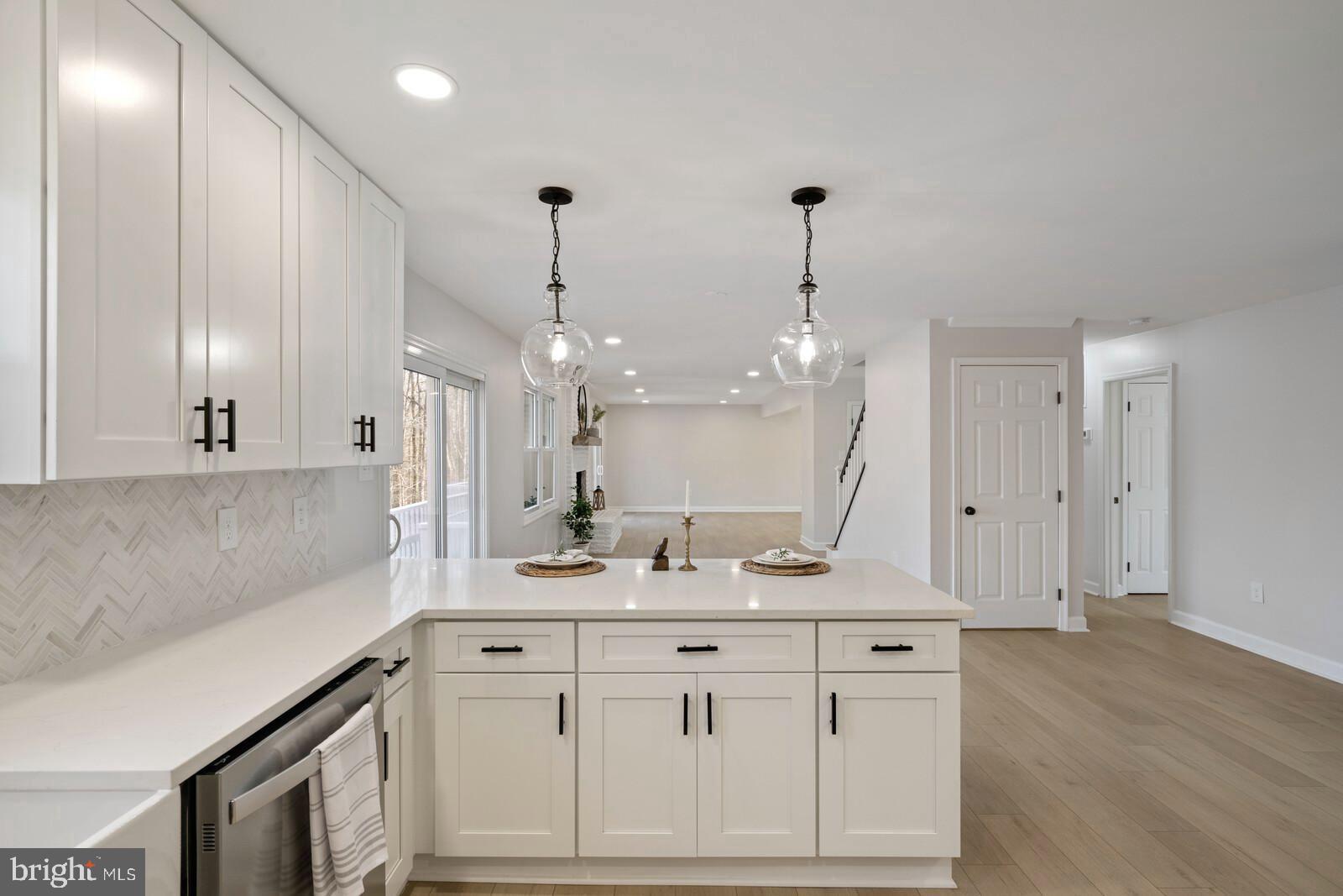 7041 Gatsby Road Manassas, VA 20112 - Photo 23 of 74 Open concept kitchen and dining areas