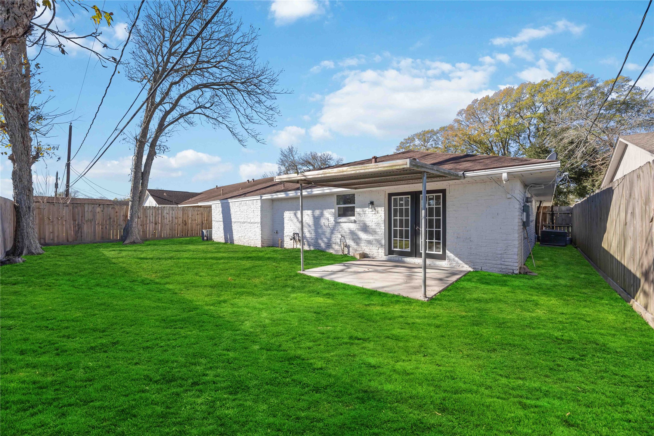 8115 Tarbell Road Houston, TX 77034 - Photo 24 of 24 a view of a house with backyard and porch