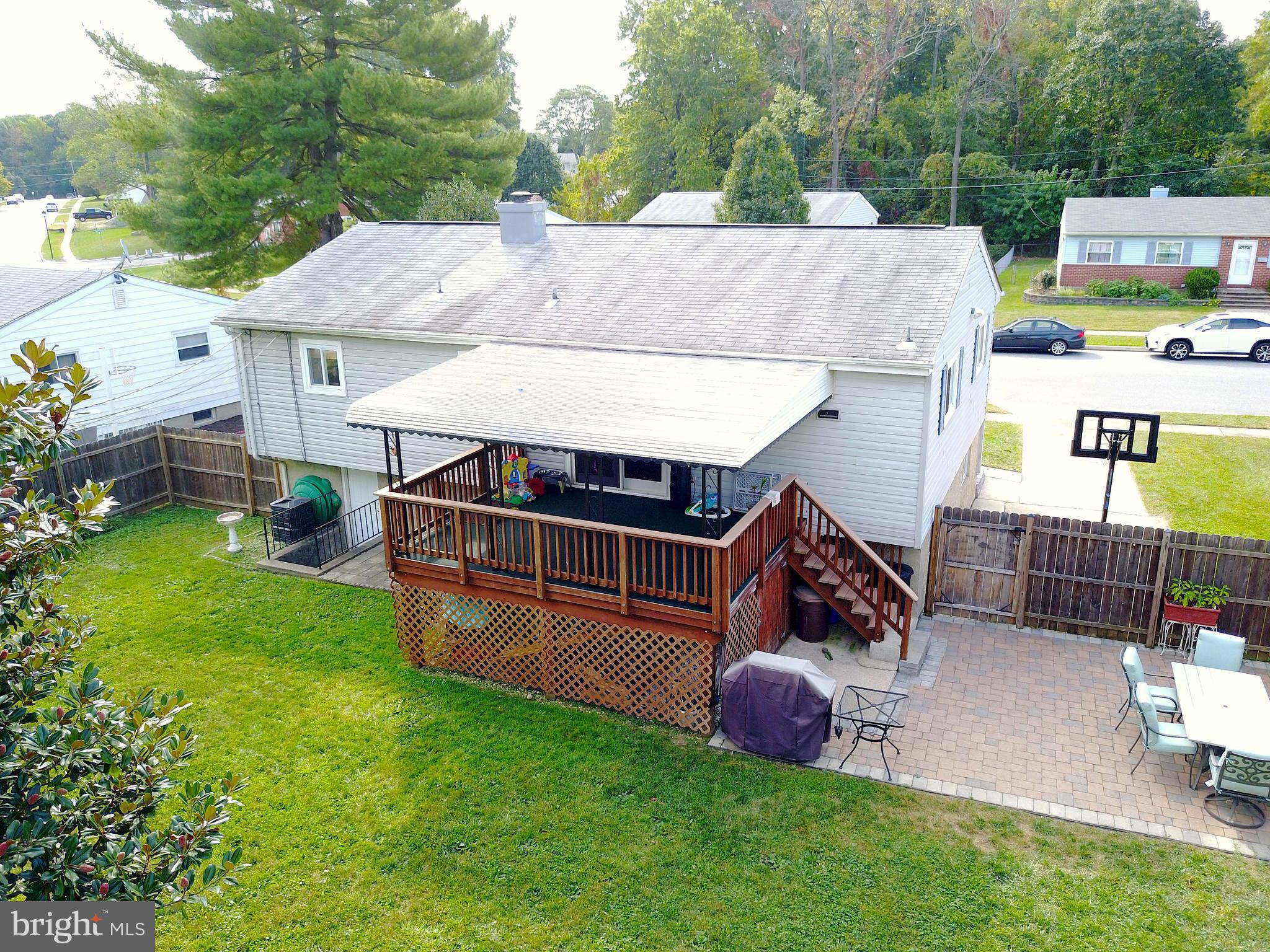 6208 Collinsway Road Baltimore, MD 21228 - Photo 21 of 22 an aerial view of a house with garden space and street view