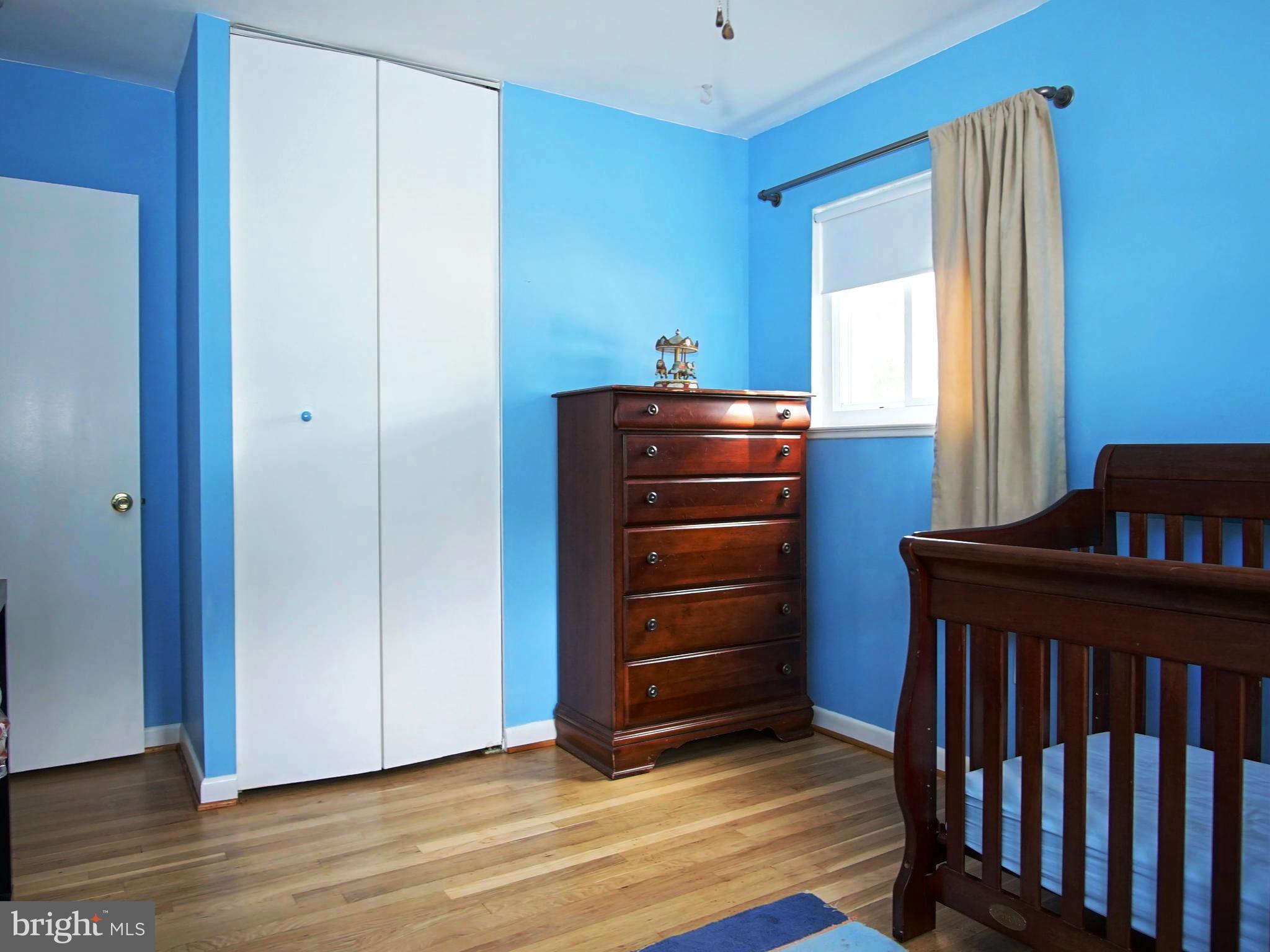6208 Collinsway Road Baltimore, MD 21228 - Photo 8 of 22 a room with a bed and a window