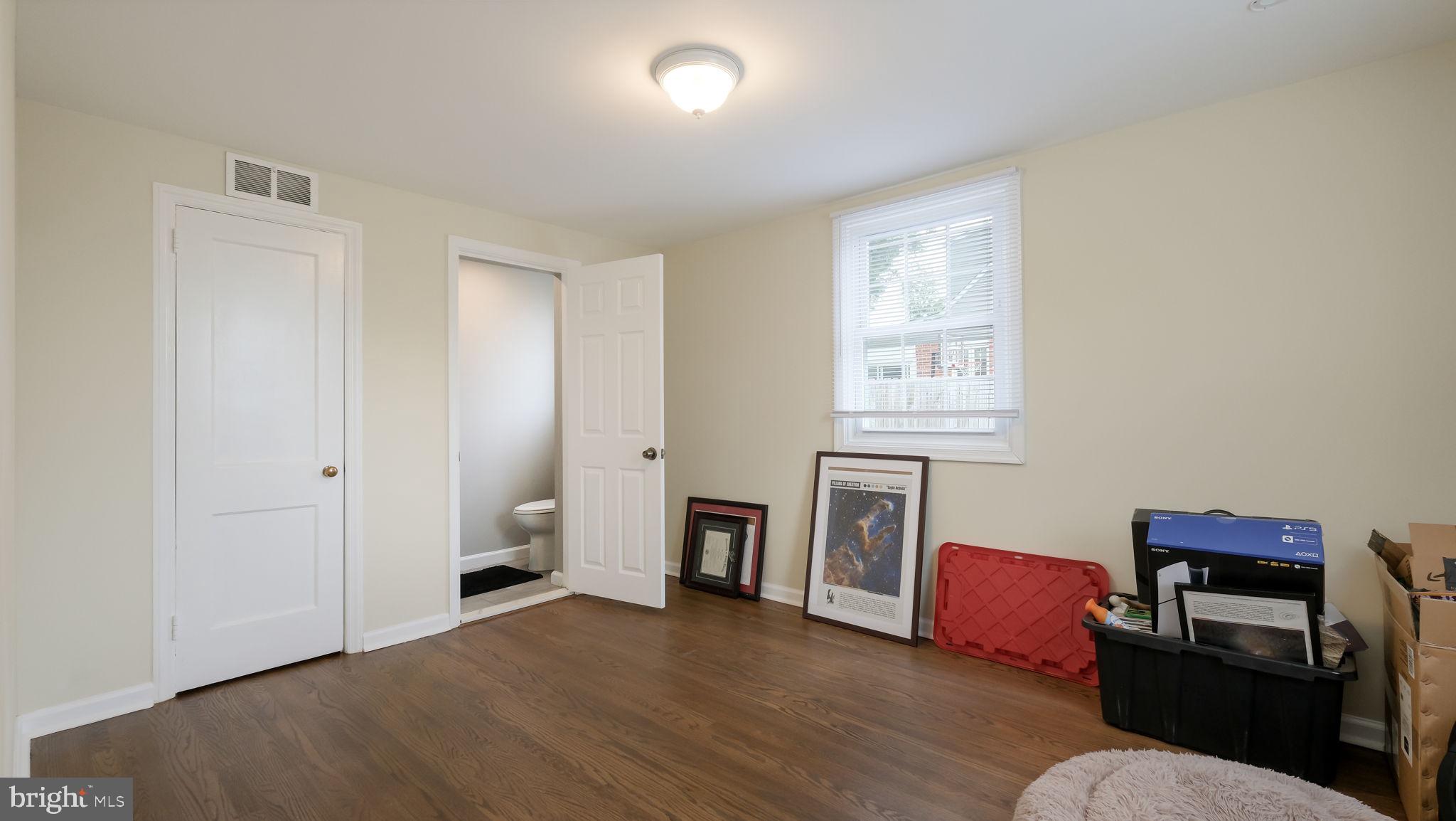 626 Topsfield Road Hatboro, PA 19040 - Photo 15 of 29 a view of a livingroom with furniture a ceiling fan and wooden floor