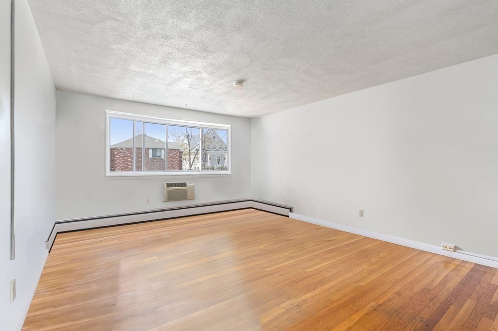 20 Radcliffe Road, Unit 304 Boston, MA 02134 - Photo 13 of 24 a view of an empty room with a window