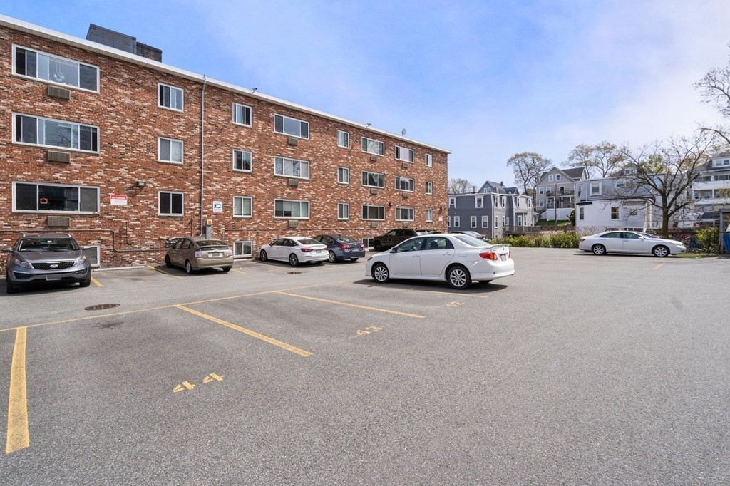 20 Radcliffe Road, Unit 304 Boston, MA 02134 - Photo 8 of 24 a view of a cars parked in front of a building
