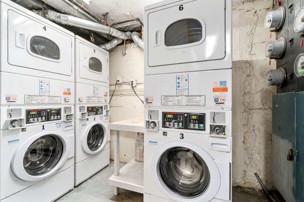 20 Radcliffe Road, Unit 304 Boston, MA 02134 - Photo 9 of 24 a utility room with dryer and washer