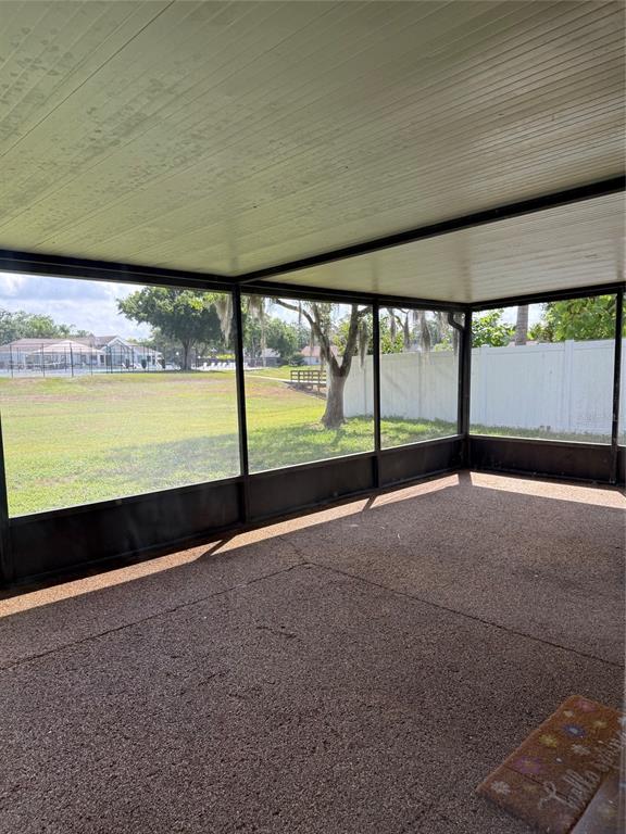 1636 Baker Road Lutz, FL 33559 - Photo 11 of 13 a view of an empty room with a large window
