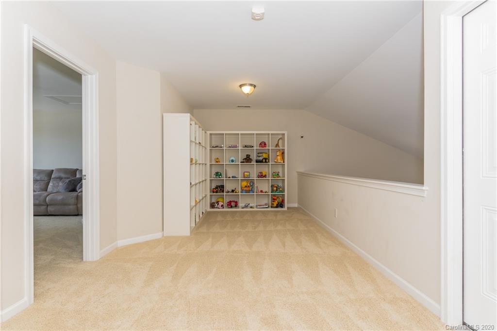 547 White Springs Road Fort Mill, SC 29708 - Photo 22 of 31 a view of a big room with closet and racks on the wall