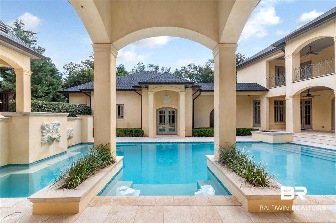 4 Chancery Court Mobile, AL 36608 - Photo 43 of 54 View of swimming pool featuring a patio area and french doors