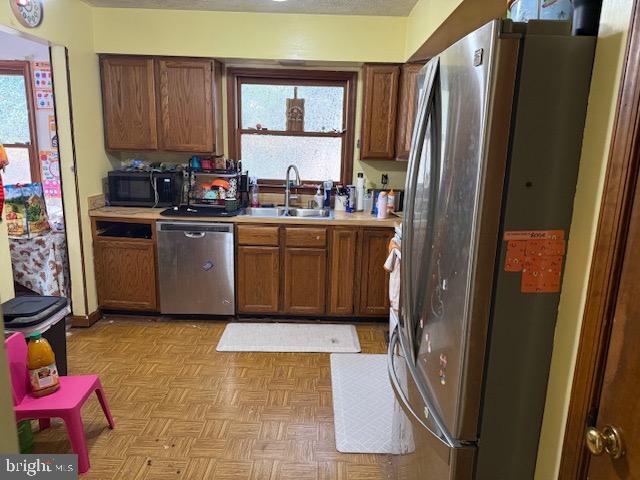 128 Jefferson Avenue Locust Grove, VA 22508 - Photo 6 of 9 a kitchen with granite countertop a refrigerator stove and sink