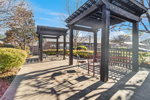 a view of a porch with wooden floor