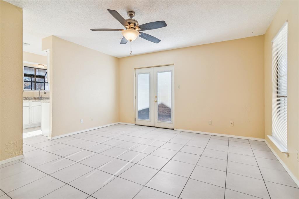 2111 East Belt Line Road, Unit 132C Richardson, TX 75081 - Photo 5 of 15 an empty room with closet and windows
