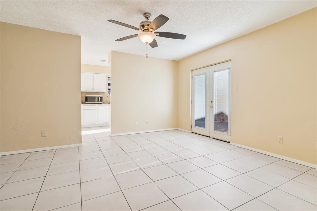 2111 East Belt Line Road, Unit 132C Richardson, TX 75081 - Photo 6 of 15 a view of an empty room with a window