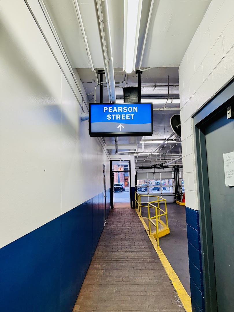 111 East Chestnut Street, Unit 6A1 Chicago, IL 60611 - Photo 5 of 5 a view of an entryway with wooden floor
