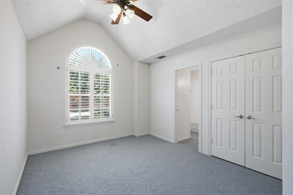 14584 Blueberry Court Addison, TX 75001 - Photo 27 of 40 an empty room with a window