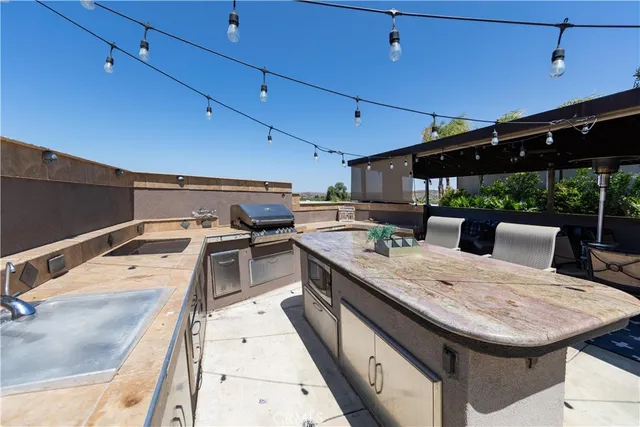 a view of a kitchen with a sink and dishwasher