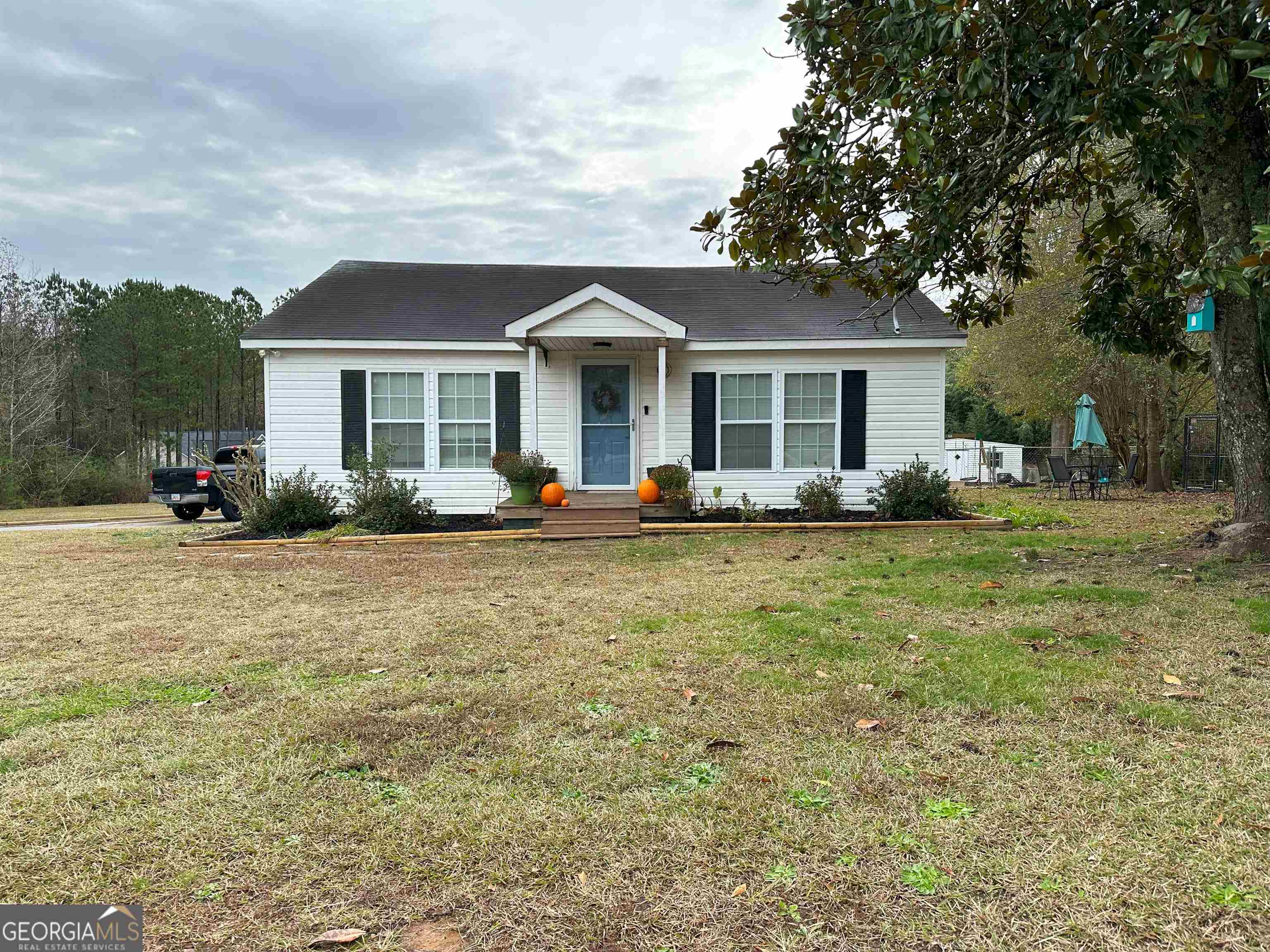 141 Bartley Road LaGrange, GA 30241 - Photo 1 of 1 a front view of house with yard and green space