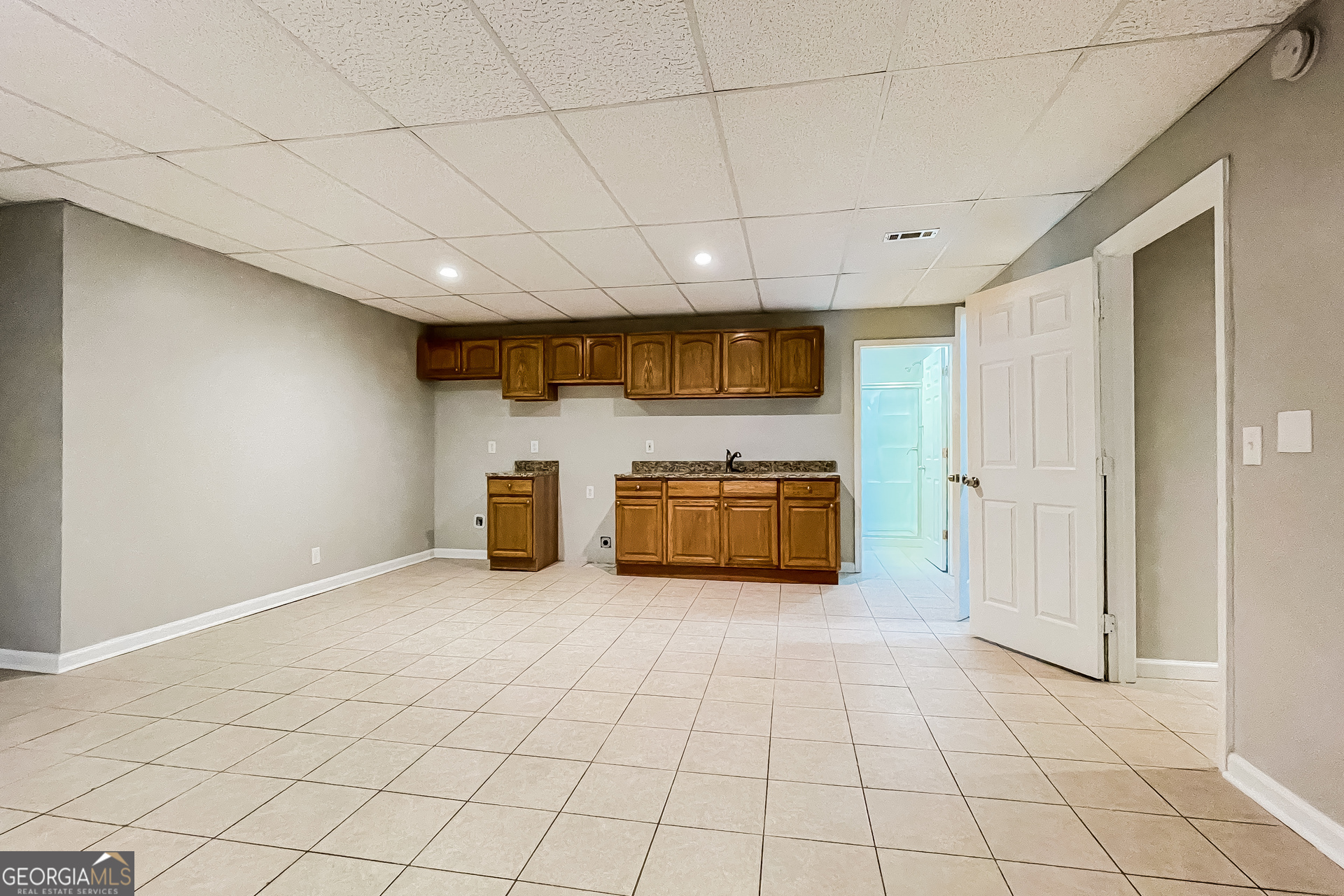 107 Johnny Lane Dallas, GA 30132 - Photo 12 of 17 a view of an empty room with a fireplace