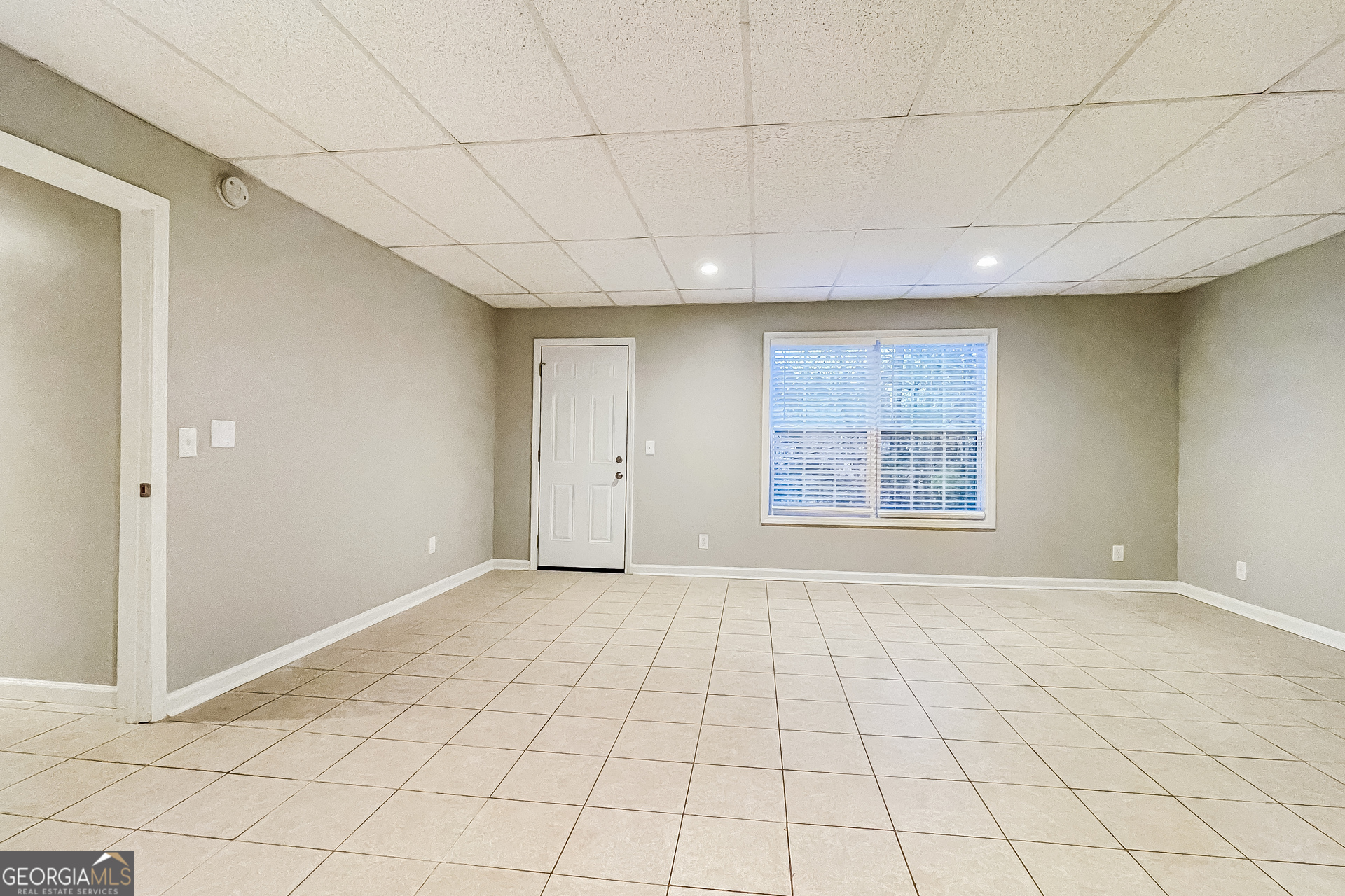 107 Johnny Lane Dallas, GA 30132 - Photo 13 of 17 an empty room with windows