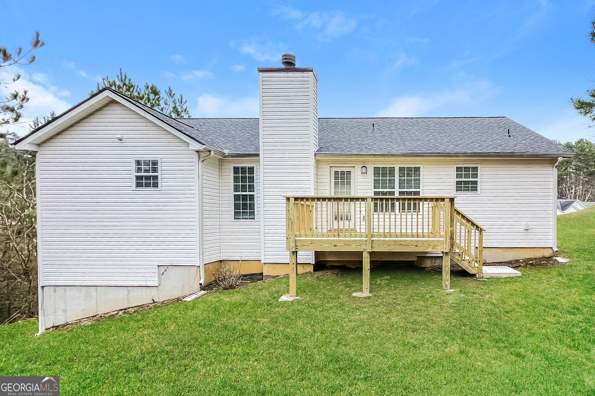 107 Johnny Lane Dallas, GA 30132 - Photo 15 of 17 a view of a house with a backyard