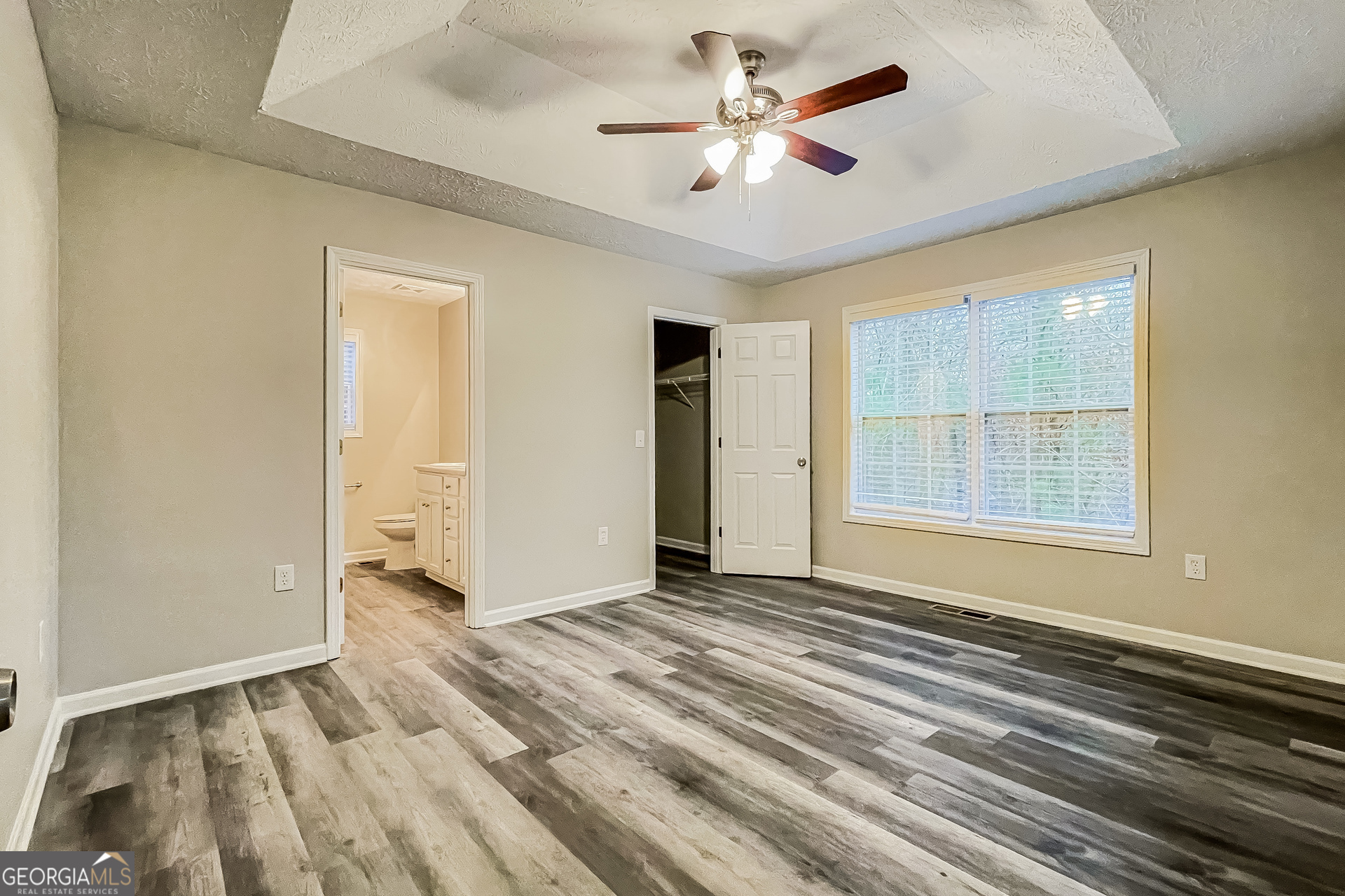 107 Johnny Lane Dallas, GA 30132 - Photo 5 of 17 a view of an empty room with a window