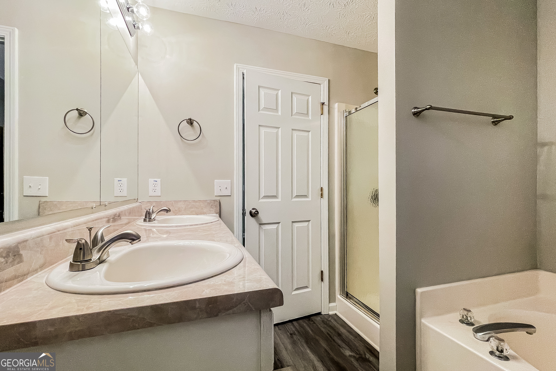 107 Johnny Lane Dallas, GA 30132 - Photo 6 of 17 a bathroom with a sink and a mirror