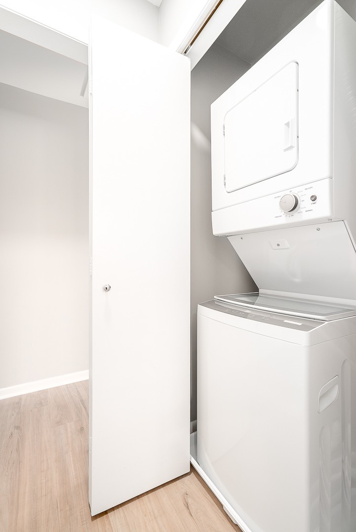 27 South Spring Avenue, Unit 2 La Grange, IL 60525 - Photo 12 of 13 a room with a washer and dryer