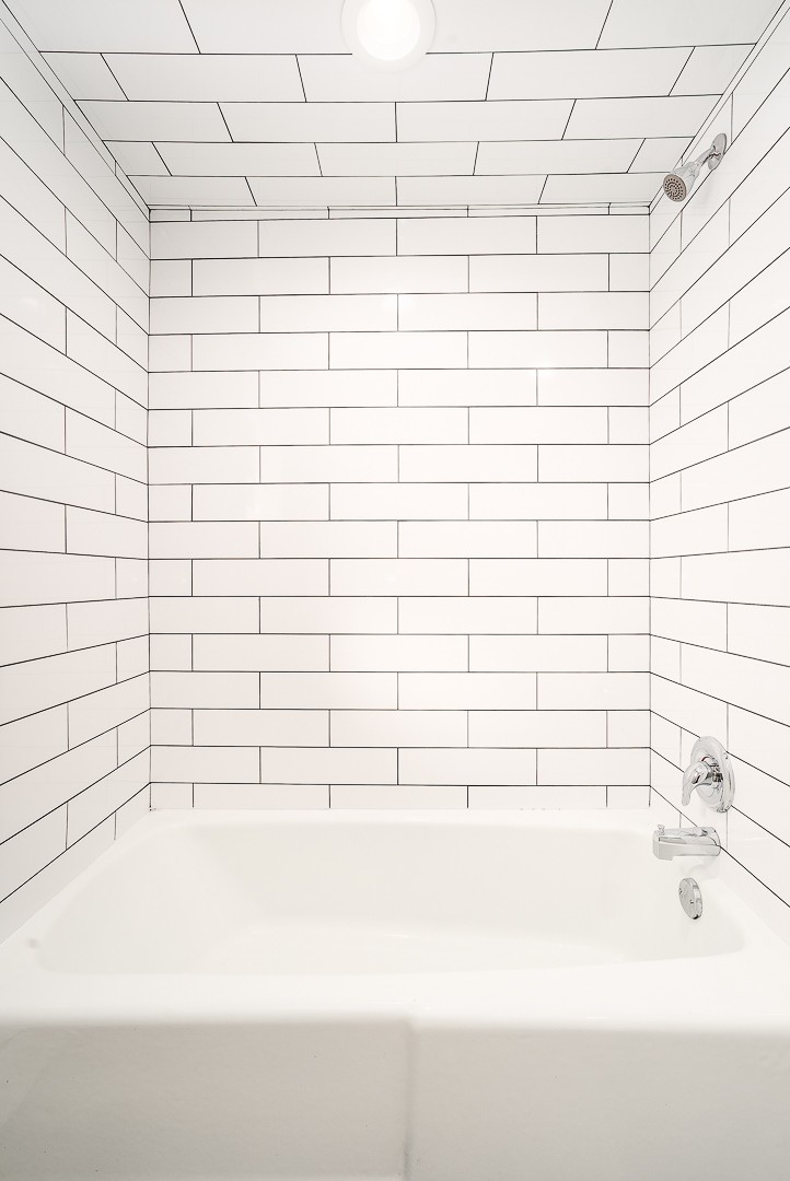 27 South Spring Avenue, Unit 2 La Grange, IL 60525 - Photo 13 of 13 a bathroom with a bathtub and shower