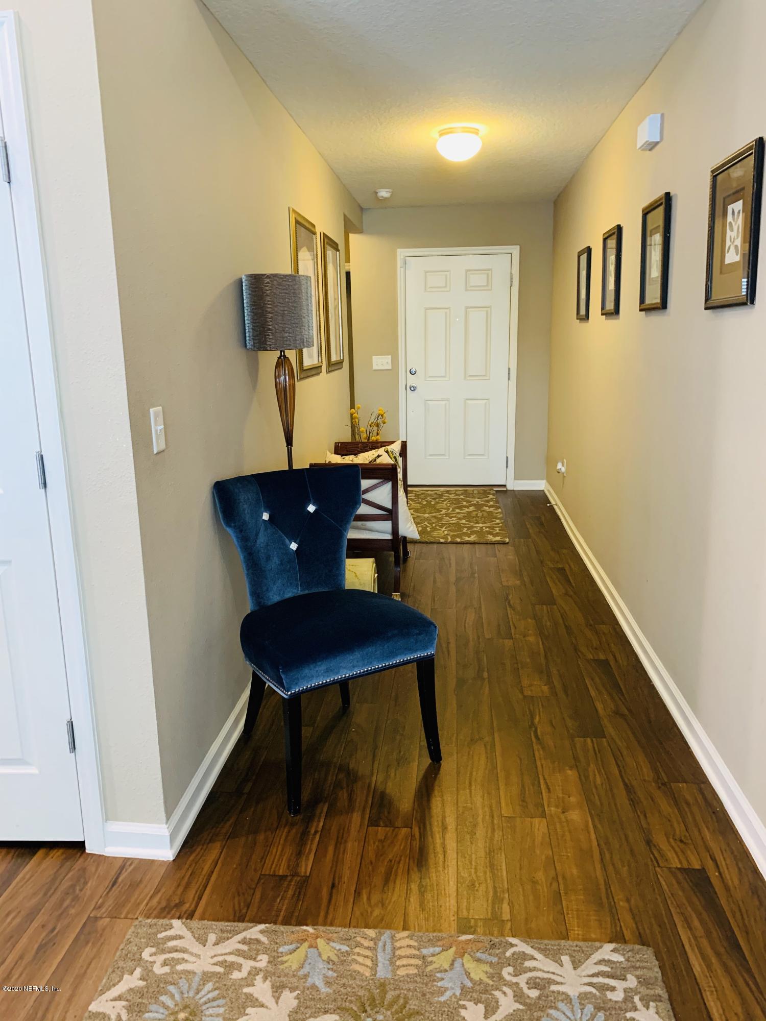 16007 Hutton Lane Jacksonville, FL 32218 - Photo 11 of 29 a view of a livingroom with furniture and wooden floor