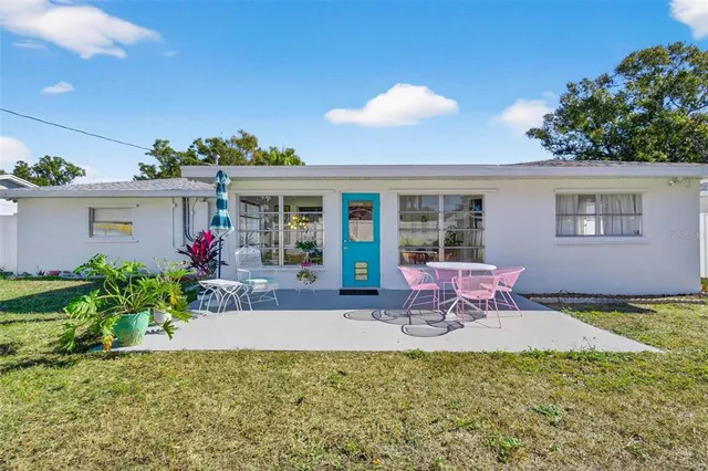 a view of a backyard with a small cabin
