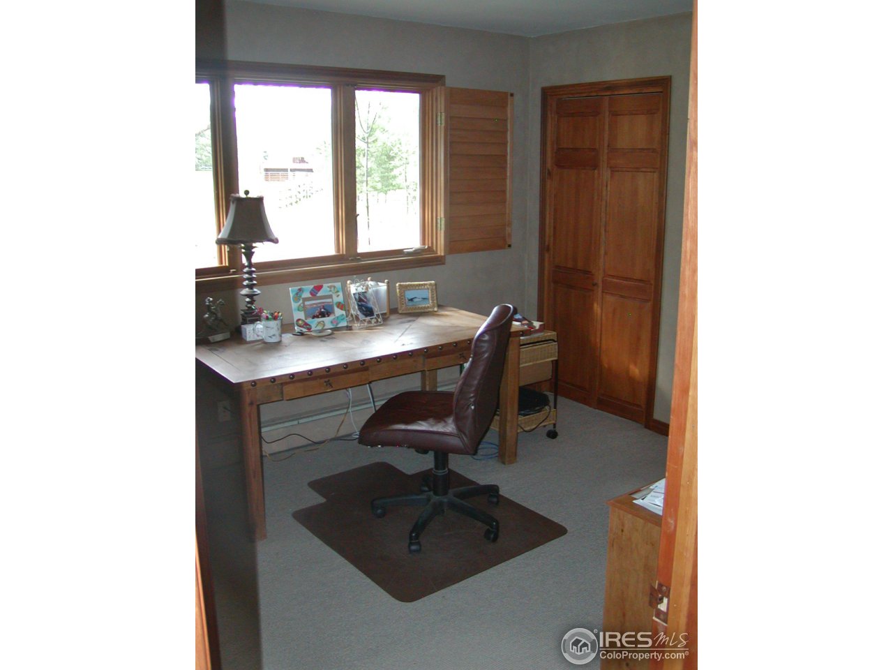3262 Nebo Road Boulder, CO 80302 - Photo 16 of 24 a dining room with furniture and a window