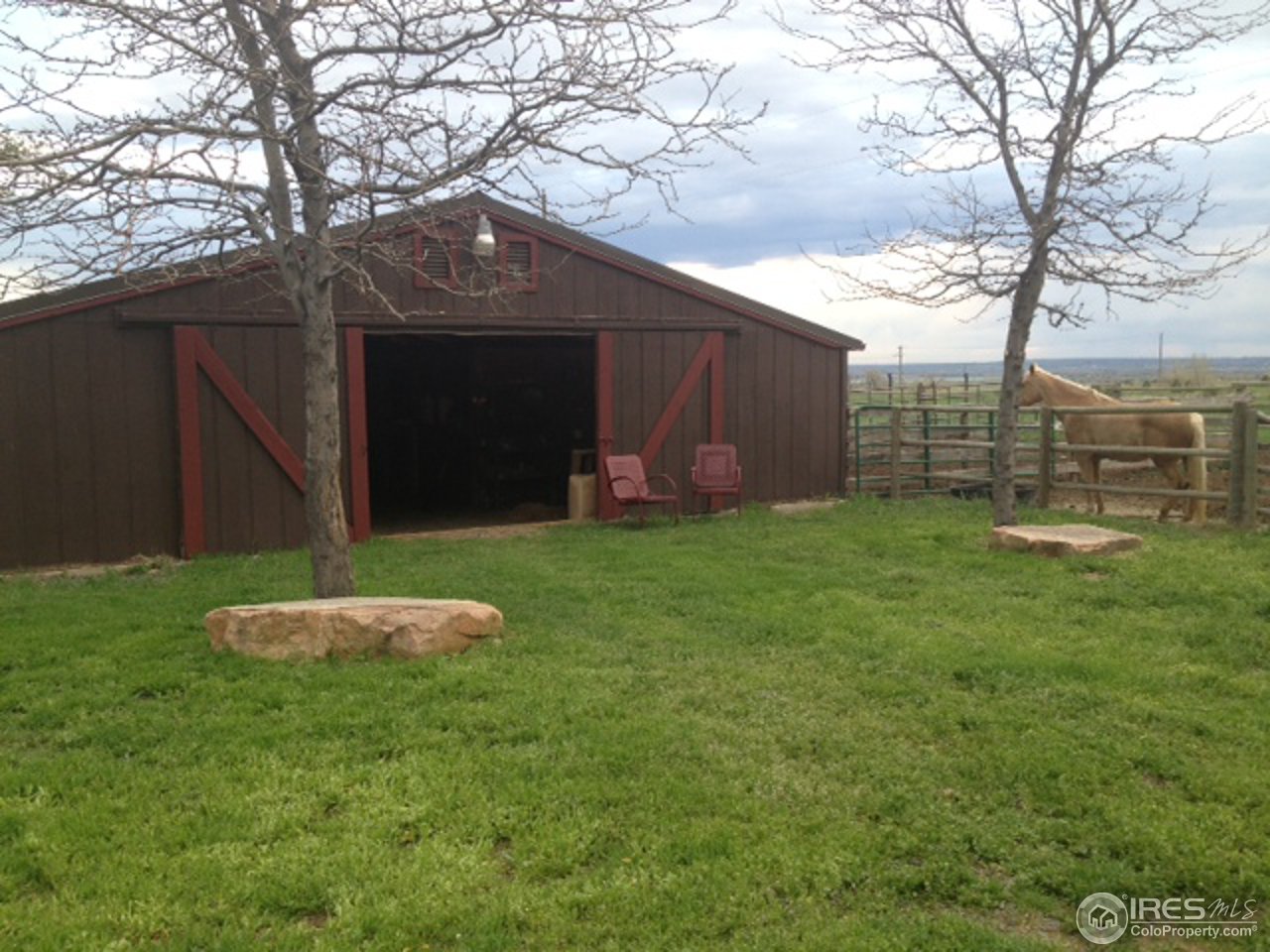 3262 Nebo Road Boulder, CO 80302 - Photo 19 of 24 a front view of a house with a yard