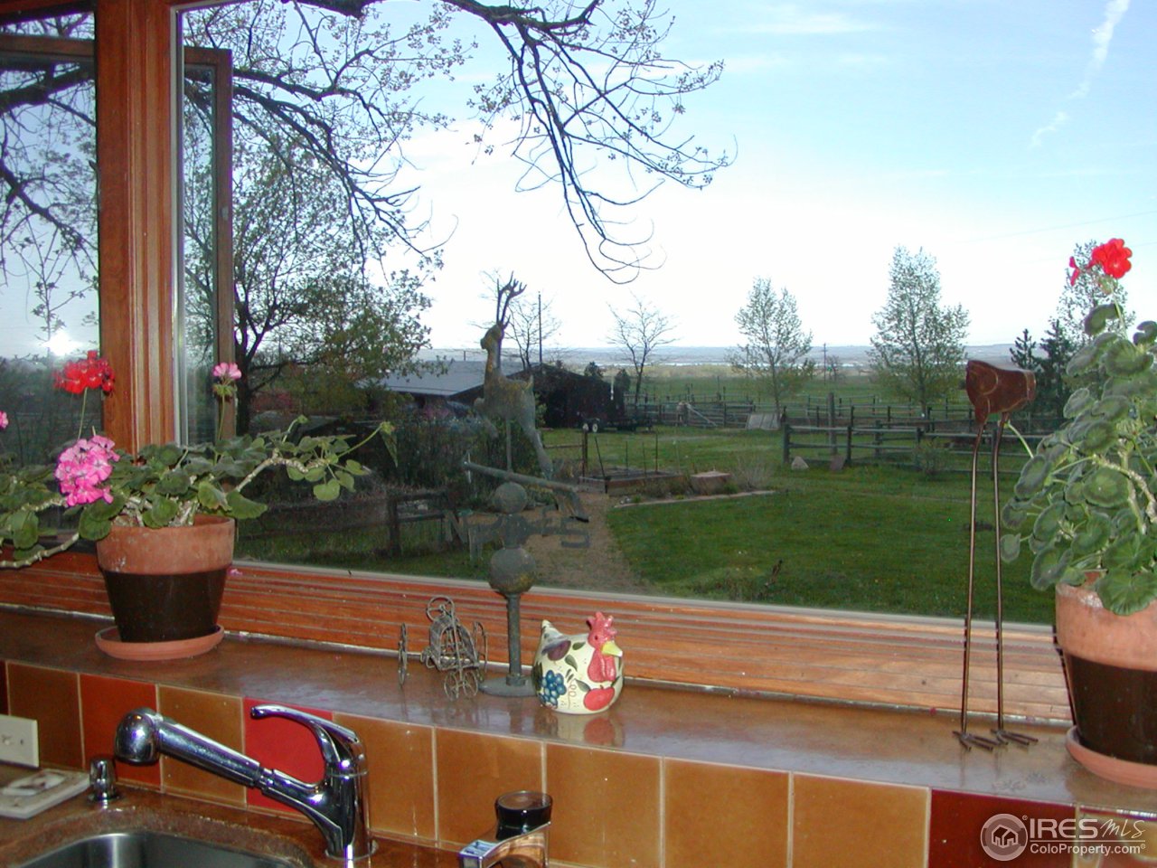 3262 Nebo Road Boulder, CO 80302 - Photo 7 of 24 a view of a table and chairs in the garden