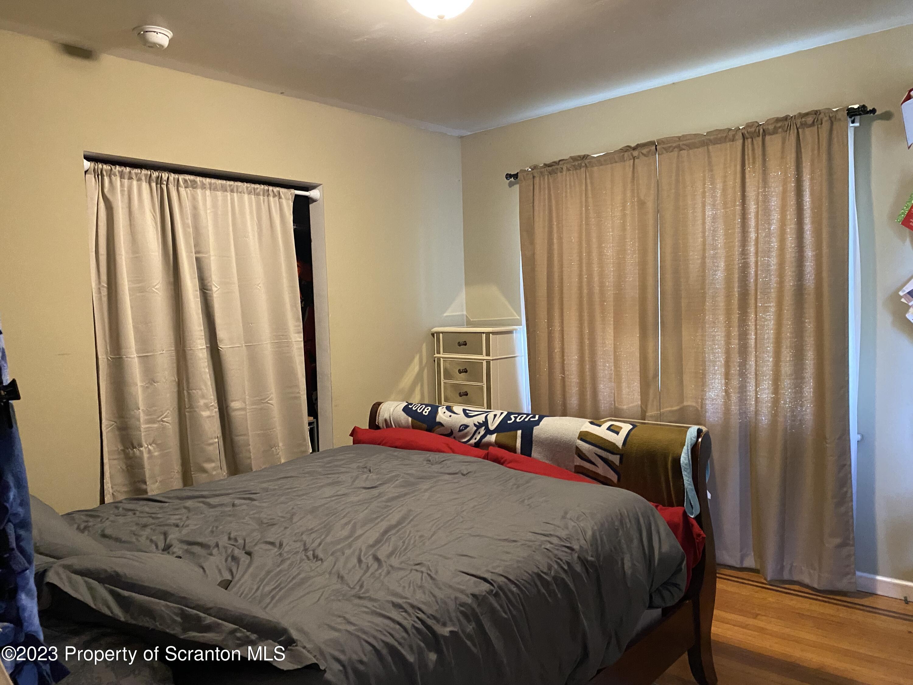 1058 Interchange Road Gilbert, PA 18331 - Photo 11 of 17 a bedroom with a bed and a window