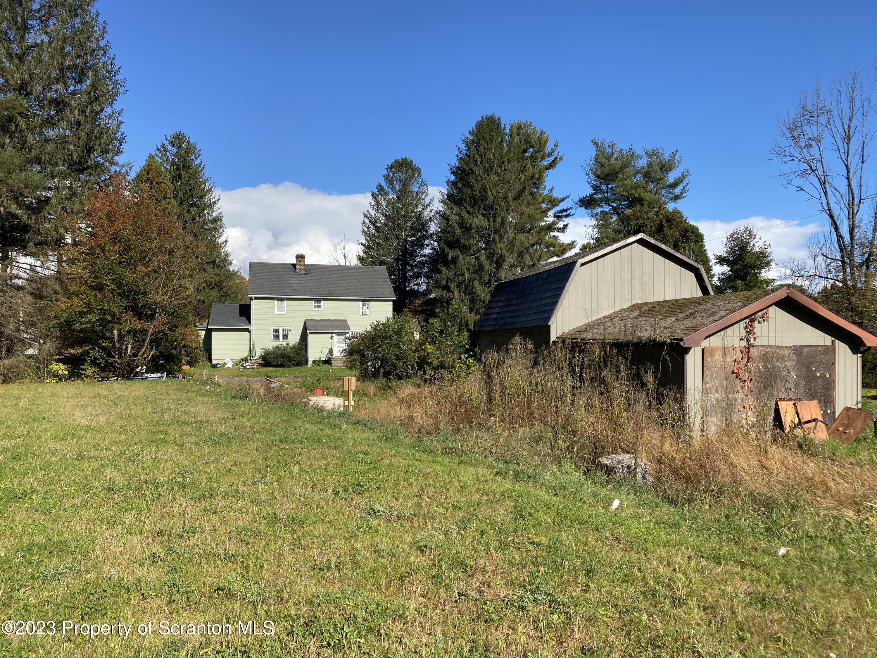 1058 Interchange Road Gilbert, PA 18331 - Photo 4 of 17 a view of a house with a yard