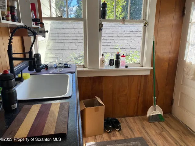 view of living room with furniture and a window